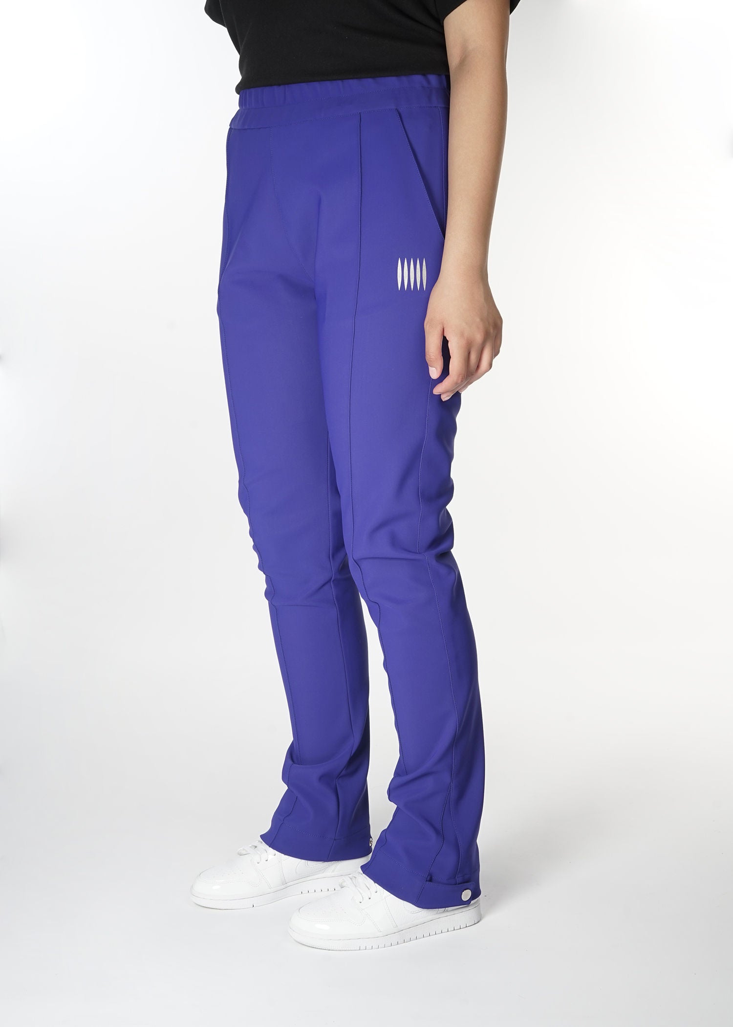 https://www.chromableparis.com/cdn/shop/products/chromable-relaxed-flare-track-pants-blue-side.jpg?v=1623765074